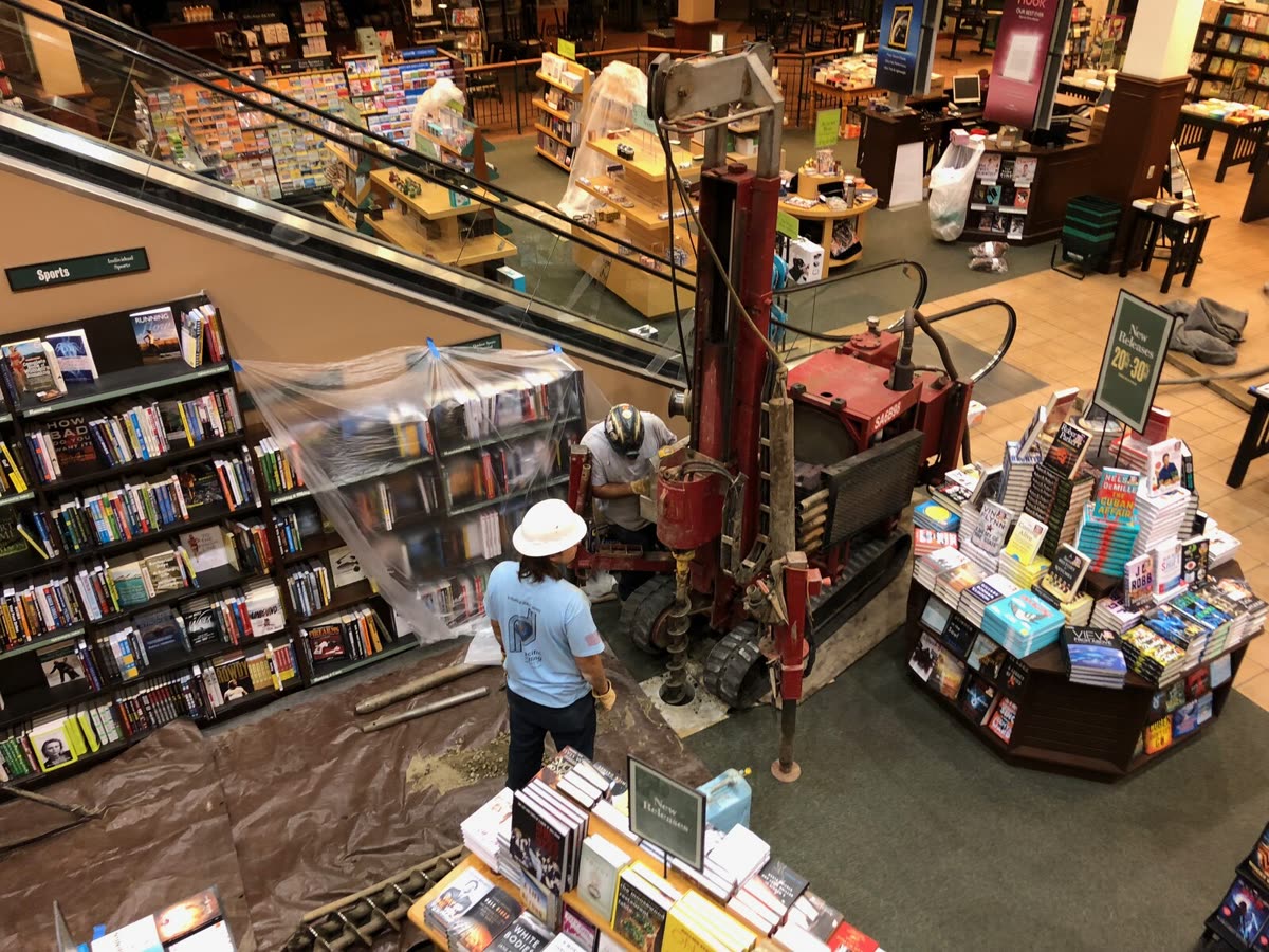 Mini-Mole track rig working inside an occupied building